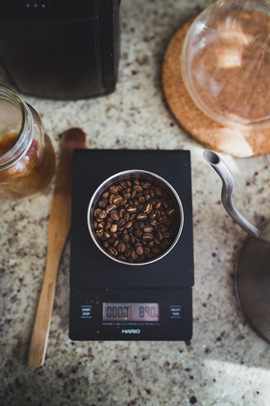 coffee beans on an electronic weighing scale