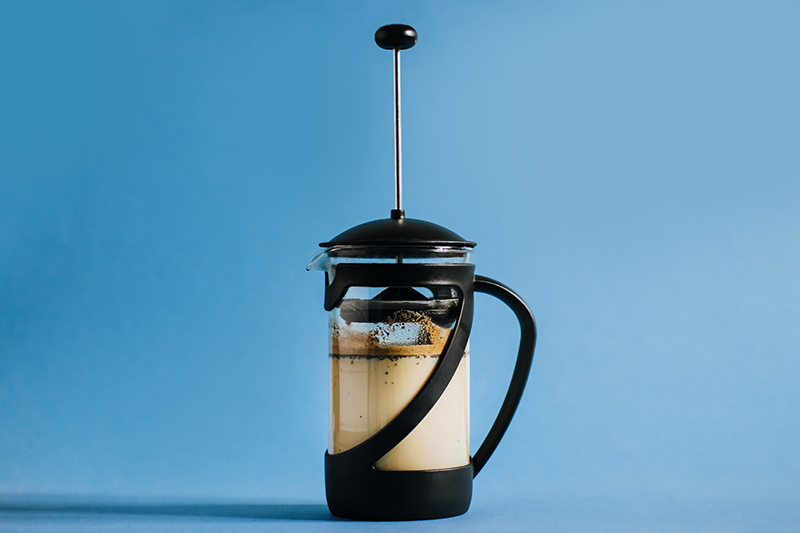 coffee brews in a french press